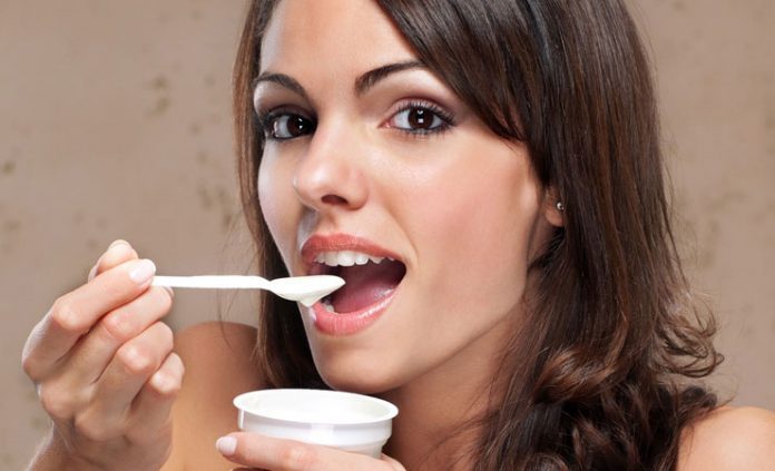 girl-eating-curd-696x423